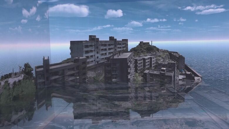 ドローンで撮影した端島を体感できる巨大スクリーン（軍艦島デジタルミュージアム）