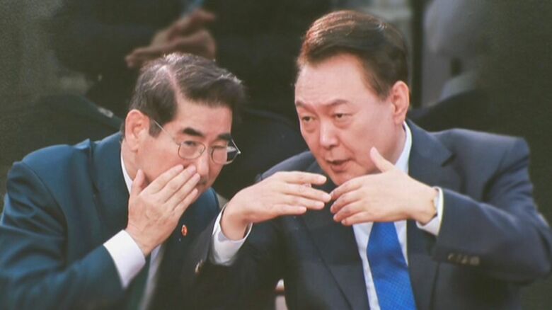 韓国の金龍顕 前国防相（左）と尹錫悦 前大統領（右）