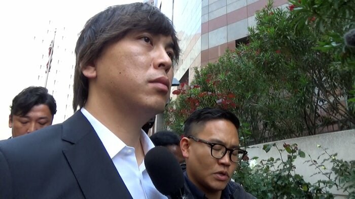 カメラの前では無言を貫いた水原一平被告