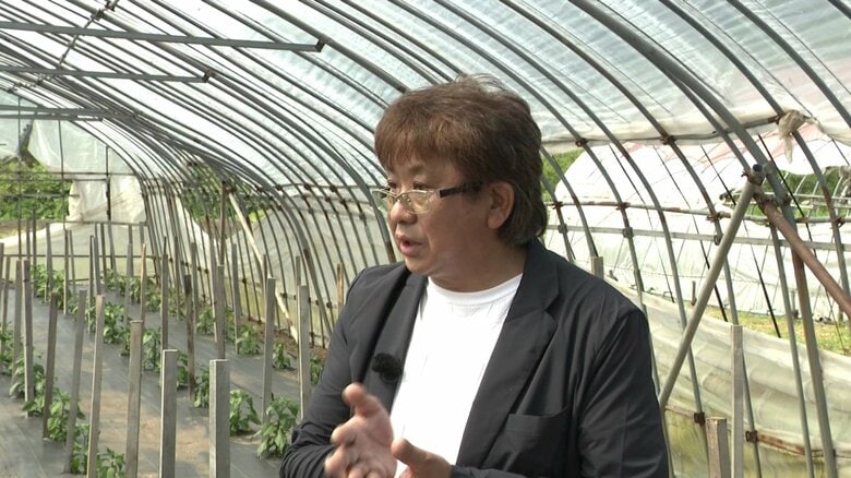 忌避剤の役割は「ここに人がいる」とクマに知らせること、と話すエコ・ワークの石岡広志代表