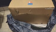 箱ボロボロで中身は破損、荷物でドア開かず