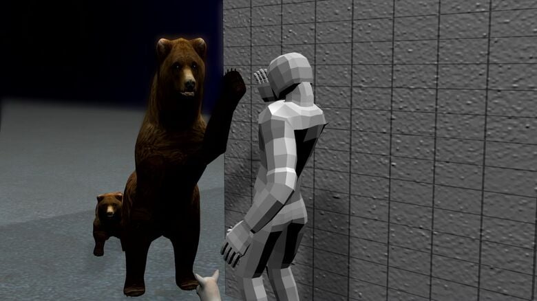 1頭が左前足で男性を攻撃