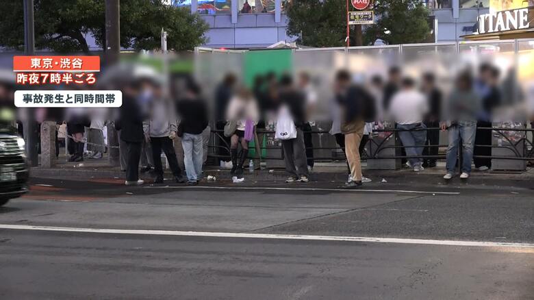 喫煙所からはみ出しタバコを吸う人たち