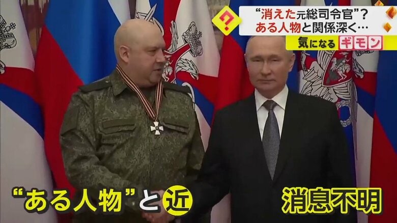 プーチン大統領と握手するスロビキン氏