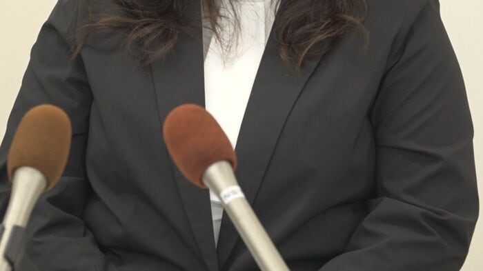 会見を開いた児童の保護者