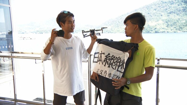 自転車での日本縦断の旅を続ける中島真吾さん(左)と石内康博さん(右)