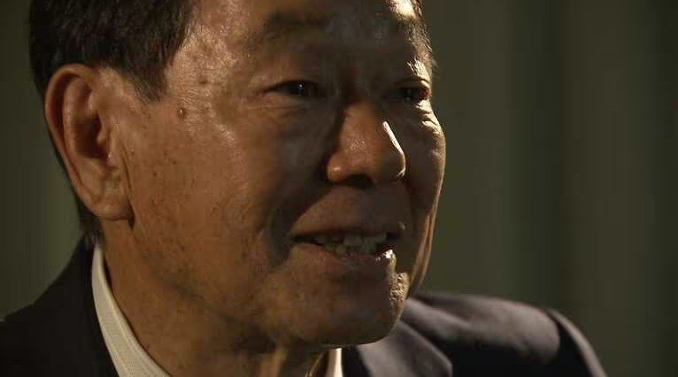 インタビューに答える河野義行さん（2018年5月）