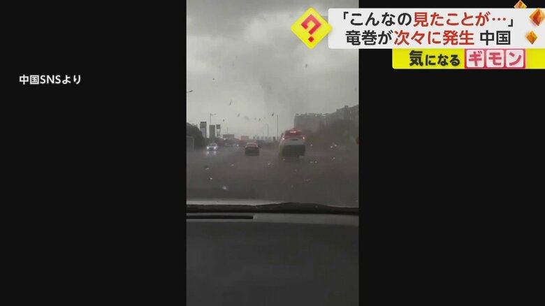 竜巻で走行中の車の後方が持ち上がる瞬間⑥