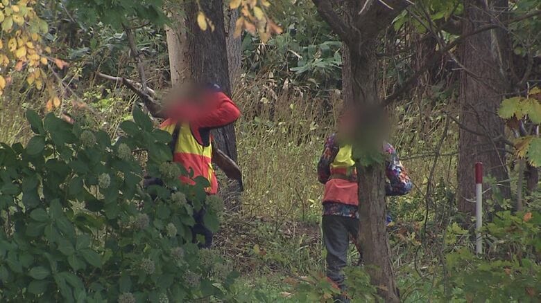 下山するハンター