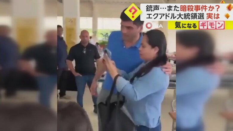 店で朝食を食べていた候補者が、支持者と写真撮影をしている