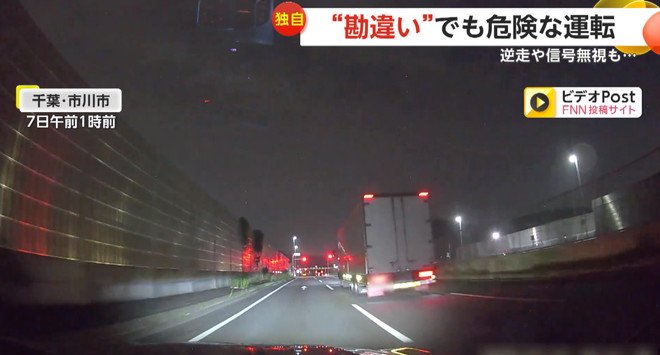 信号無視で猛スピードで交差点を走るトラック