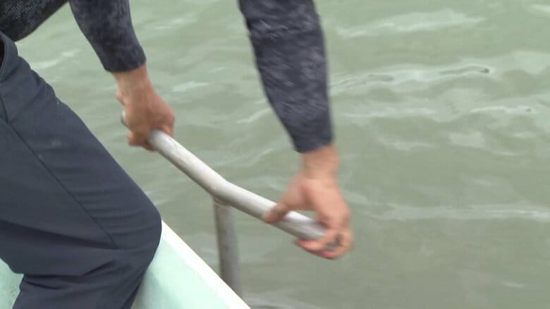 ぐるぐる回して水管を絡ませていく