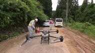 氷見市豪雨で孤立続く　40キロ搬送可能なドローンが通行止め個所を越えて支援物資を運ぶ