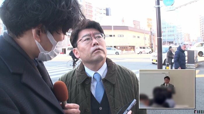 取材に応じる鬼木議員