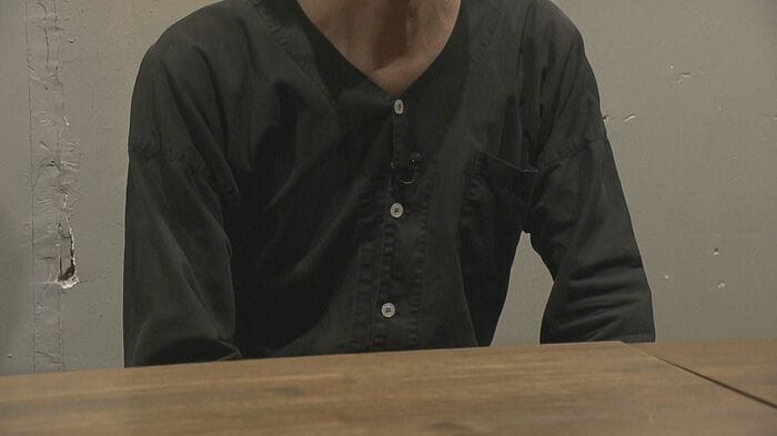 電話を受けた男性