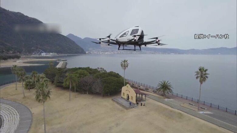 国内初“空飛ぶクルマ”人を乗せて屋外を飛行　最新型2人乗り　大分市「2025年頃実用化目指す」｜FNNプライムオンライン