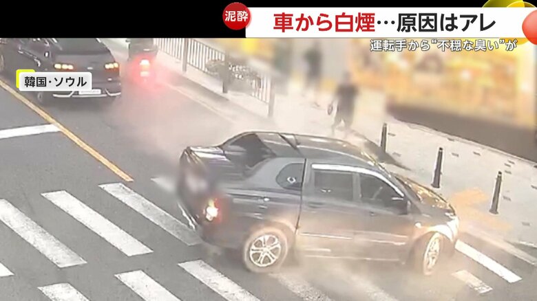 突然バックをし始め、横断歩道の上で停止した車