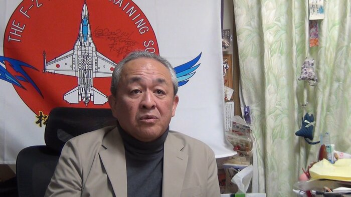 判決前にインタビューに応じる菅野被告