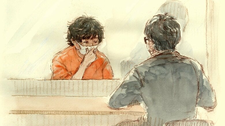 初公判前に接見に応じた油利被告(イラスト:大橋由美子)