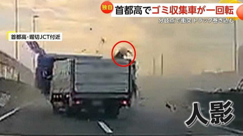 運転席から飛び出してくる人影