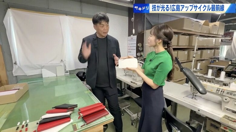 八橋装院・高橋伸英社長（左）に質問する中西アナ