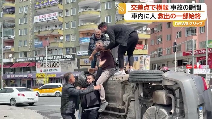 車から引き上げられたドライバーの男性（IHA）