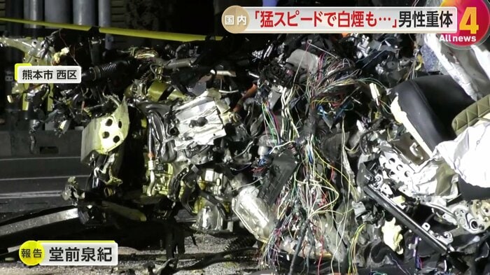 配線がむき出しになり、原型をとどめていない事故車両