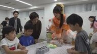 ちぎり絵やストラップを作り模擬オークション　子供たちが“お金”や経済の仕組み学ぶ　SMBC日興証券福井支店