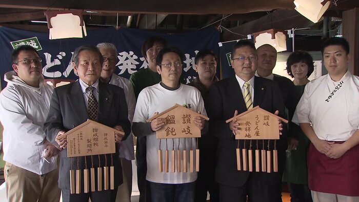 写真中央の人が吉田尚人会長
