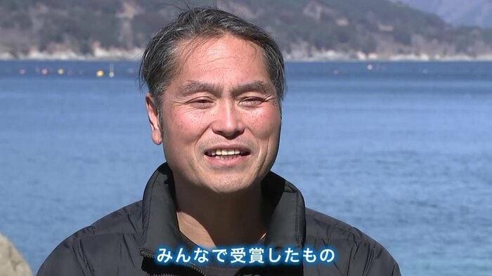喜びを語る佐藤寛志さん