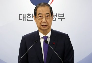 韓悳洙首相（職務停止）