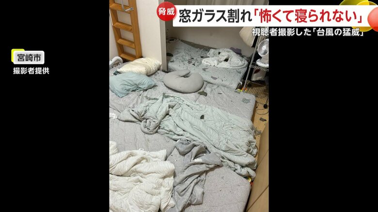 部屋に並んで敷かれた布団の上に、無数にガラス片が散らばっている。