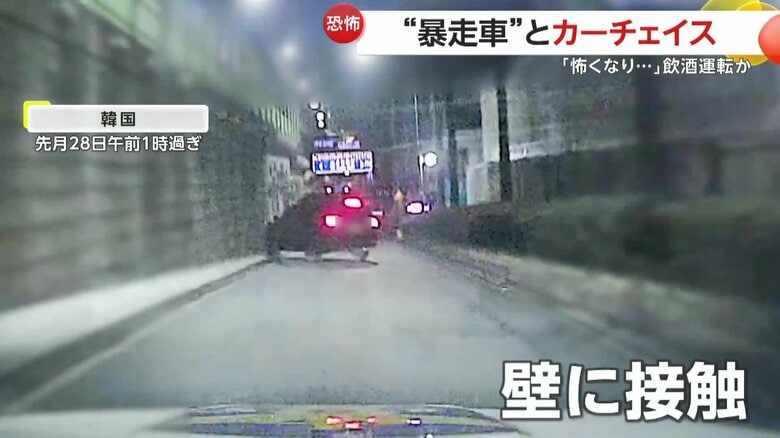 壁に接触しながら走る黒のSUV（映像提供：京畿南部警察庁）