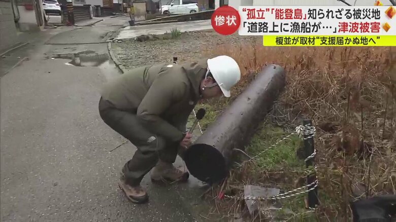 津波で流された丸太は重くてほとんど動かない