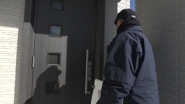 管内を巡回する高木警部補