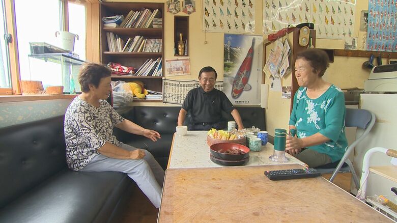 星野吟二さん（中央） 妻・サツ子さん（右）