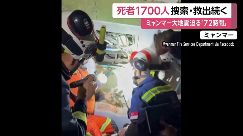 がれきの隙間に男性の姿を発見した捜索チーム