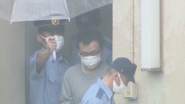 送検される海藤智仁容疑者(31)(15日 伊勢原署)