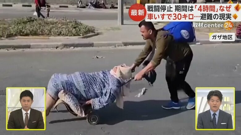 車椅子が用意できず荷物用の台車で運ばれる人も
