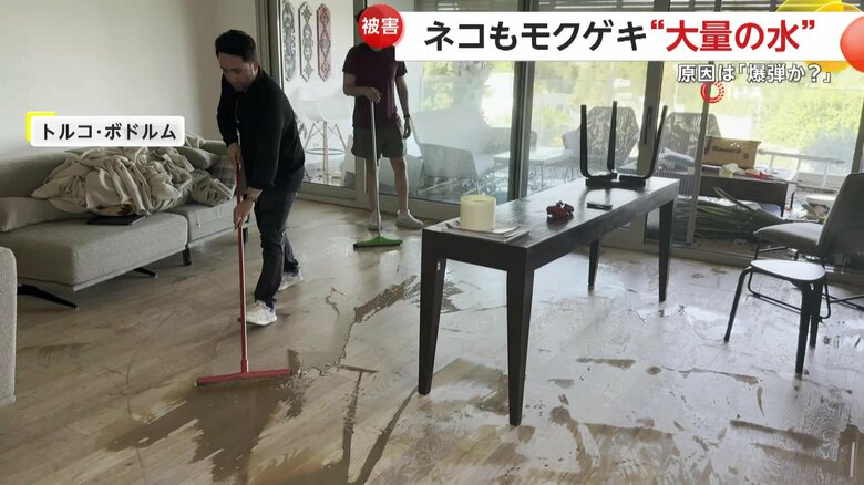 後片付けに追われる男性