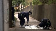 大阪地裁前で男性が首刺される　逮捕の男「金銭トラブルあった」
