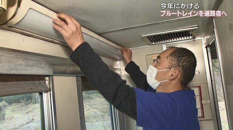 照明の修理を行う井澤孝文さん