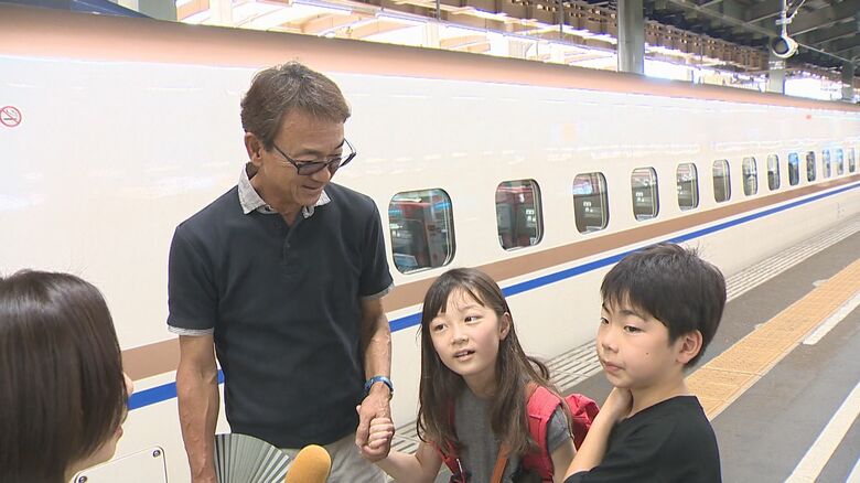 再会した祖父と孫