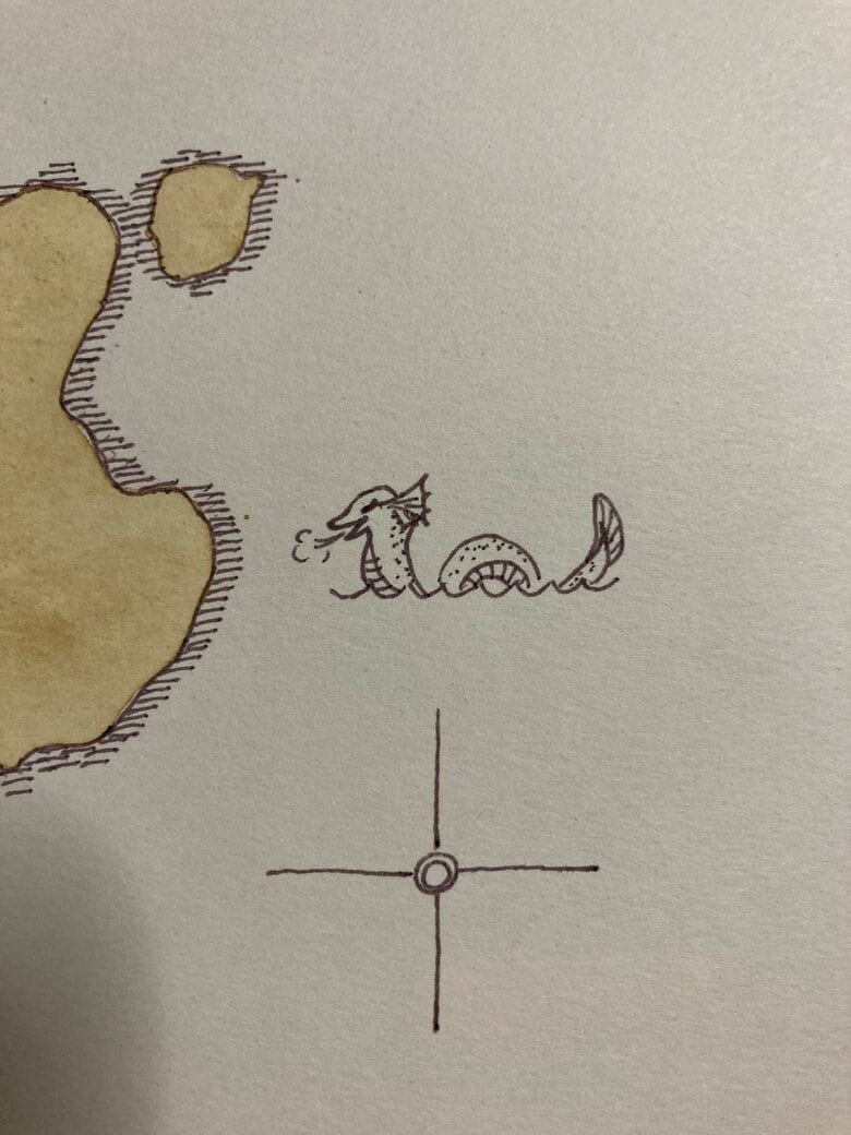 右下に、丸と十字を描いて…