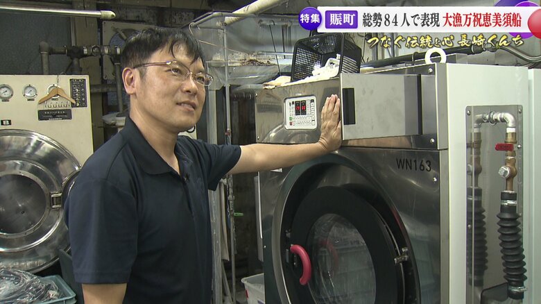 くんちに参加する町のクリーニング店主　向篤司さん