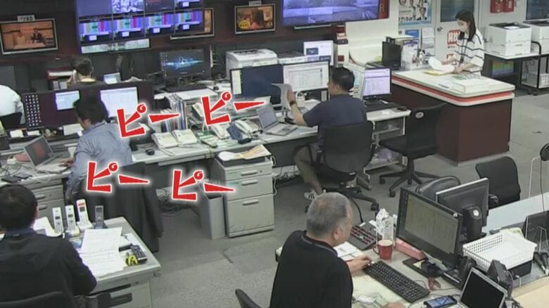 報道部に響く謎の警告音