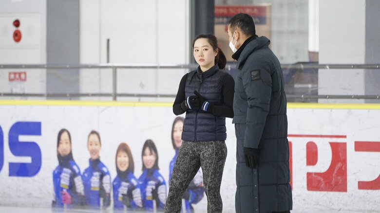 コーチと話す樋口