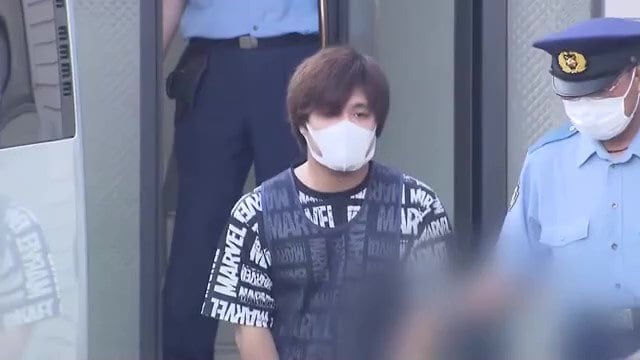 送検される直哉被告