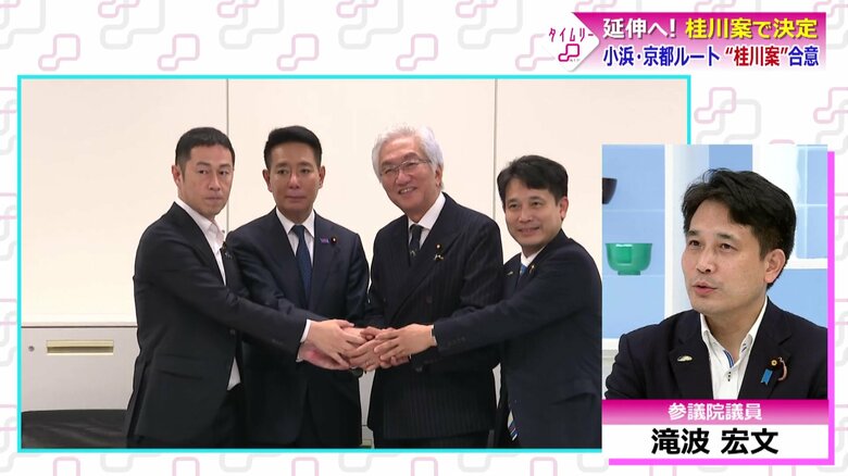 西田氏と前原の表情は対照的