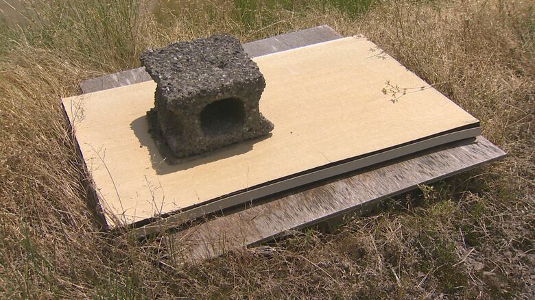 鉄のフタの代わりに木の板を使用